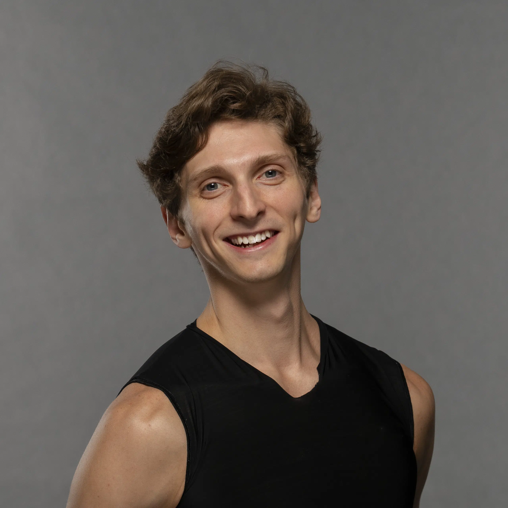 Nigel Tau Headshot scaled.jpg