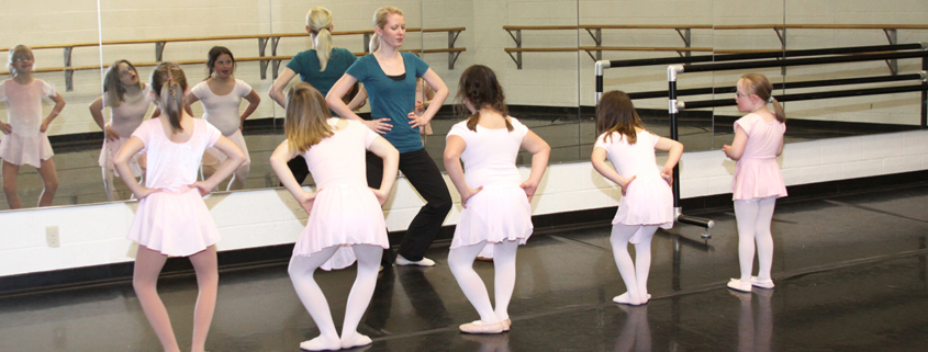 Children dancing with teacher in Adaptive Dance Class
